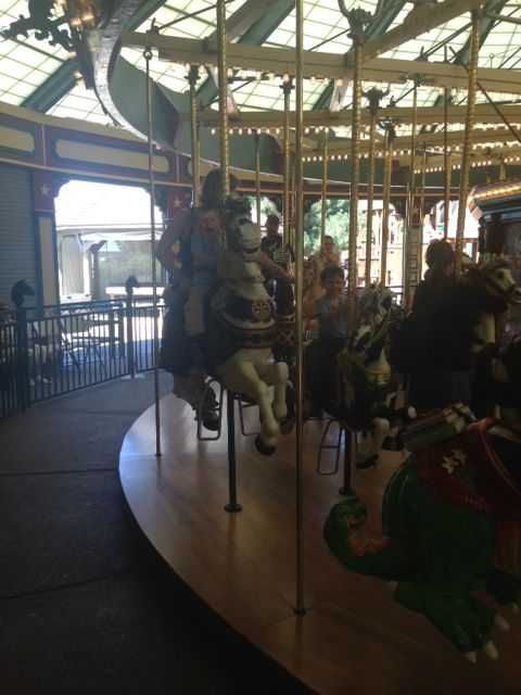 Excited boys on the Merry-Go-Round at the awesome playground in downtown Missoula. Fun fact: only hand carved merry-go-round built since the Great Depression.