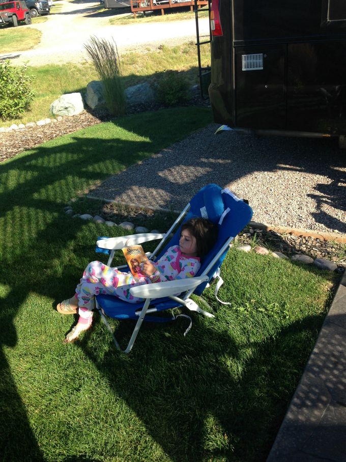 My big girl reading this AM. Can't believe she starts first grade next month!