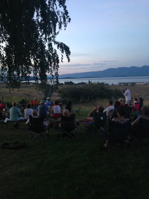 Listening to The Singing Sons of Beaches around the campfire.