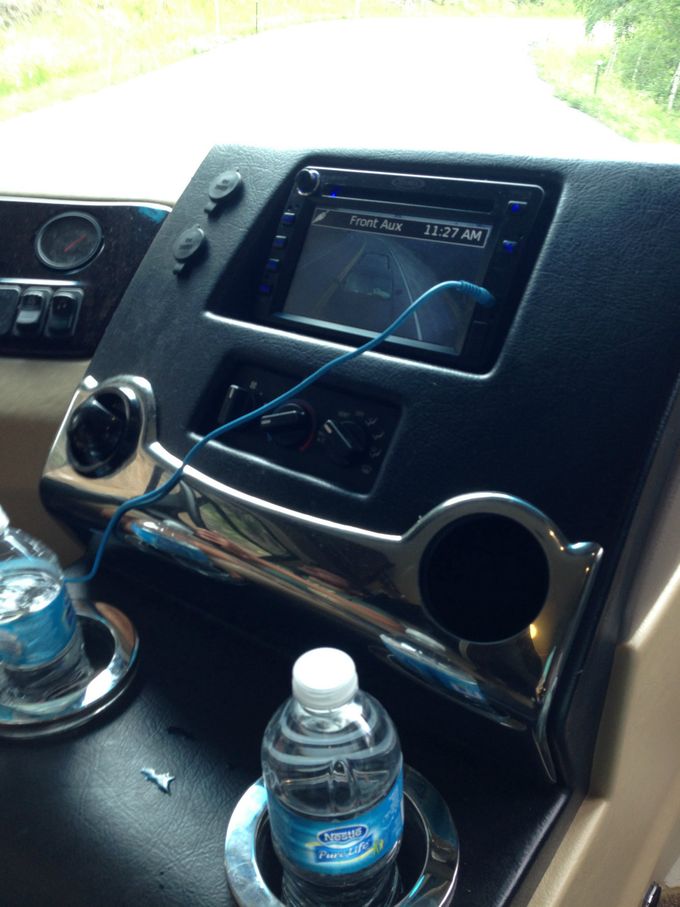 Notice anything missing? Dennis has pulled out and apparently misplaced the A/C vent.